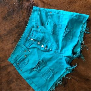 Turquoise Levi Distressed Shorts